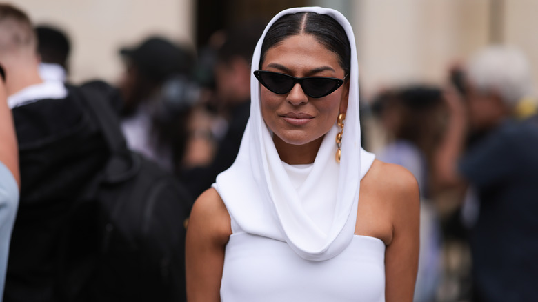 woman with cat-eye glasses