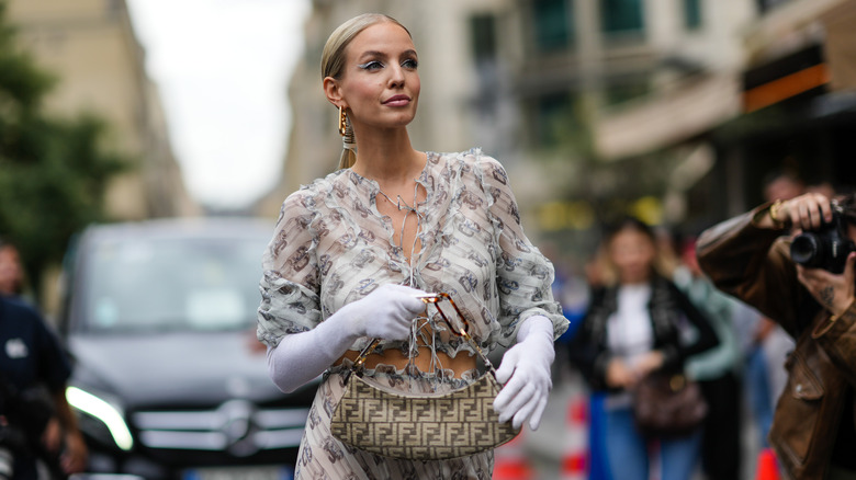 Leonie Hanne wearing sheer ruffle top