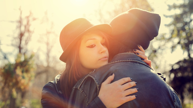 Young couple embraces