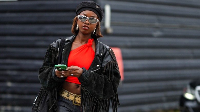 woman wearing fringe jacket