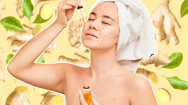 woman applying ginger oil to face