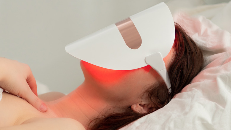 A woman doing red light therapy
