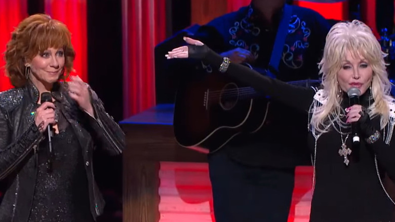 Reba McEntire and Dolly Parton at the Grand Ole Opry