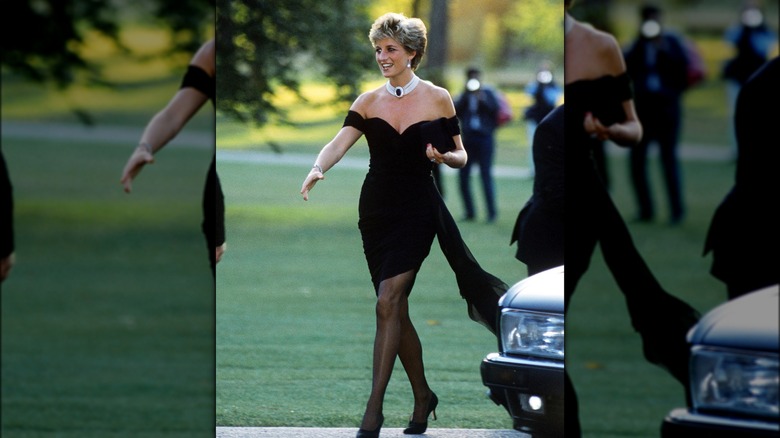Princess Diana in a black off-the-shoulder, form-fitting dress stepping out of a car.