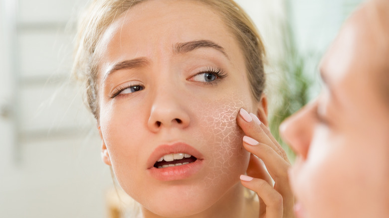 Woman with dry scaly skin