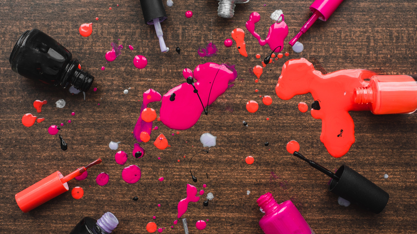 Red Nail Varnish Spilling Out Of Bottle Close Up High-Res Stock Photo -  Getty Images