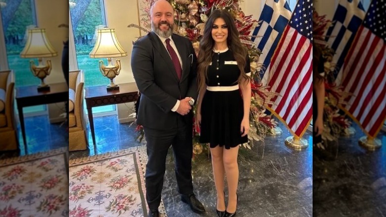 NATO assistant secretary David Baker poses with Kimberly Guilfoyle