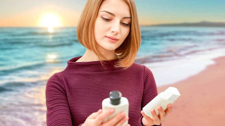 Woman looking at gradual self-tanners