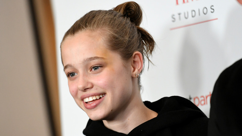 Shiloh Jolie smiling on the red carpet