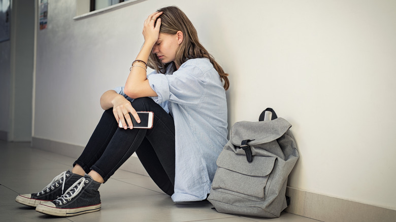 depressed woman sitting