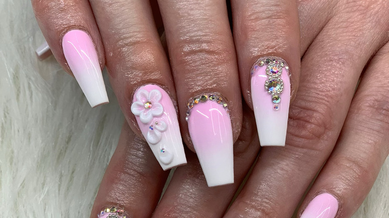 A pink 3D manicure 