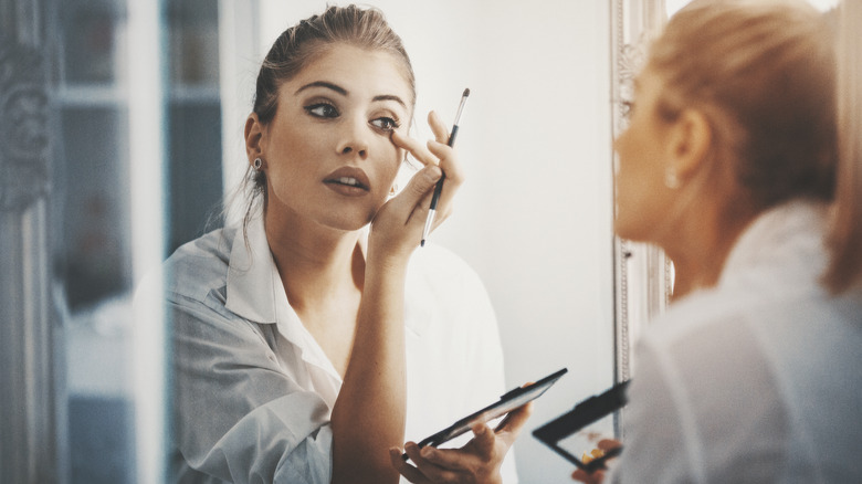 woman with white makeup