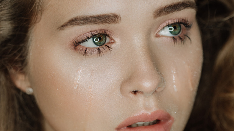 Woman crying with tears 