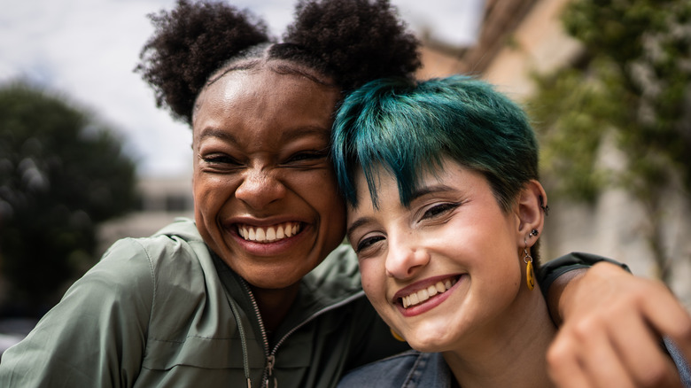 Lesbian couple happy and hugging