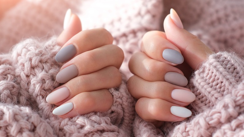 close-up of pastel nails