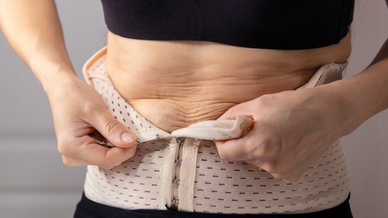 Woman wearing waist trainer