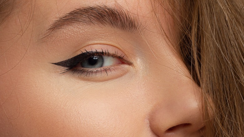 close up of woman with eyeliner