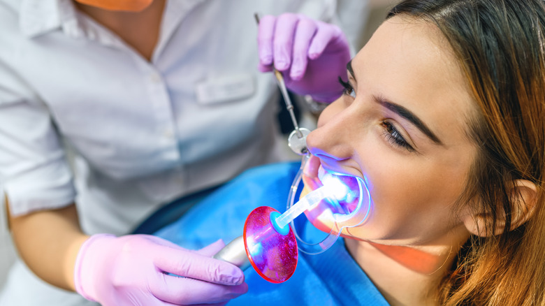 woman having led light whitening