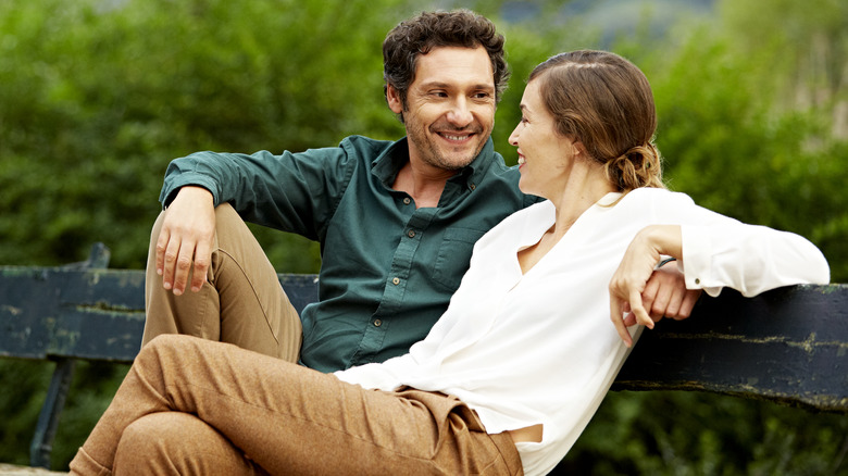 Couple sitting together in an outdoor setting