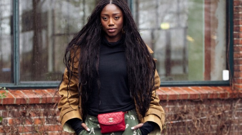 Woman wearing a chanel belt bag