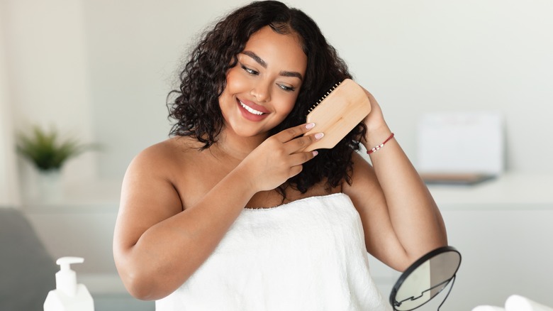 Woman brushing her hair