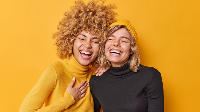 two women smiling