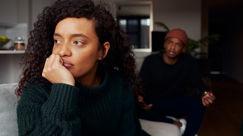 Black woman ignoring her boyfriend