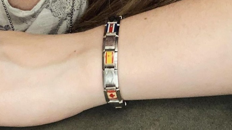 Wrist displays italian charm bracelet 