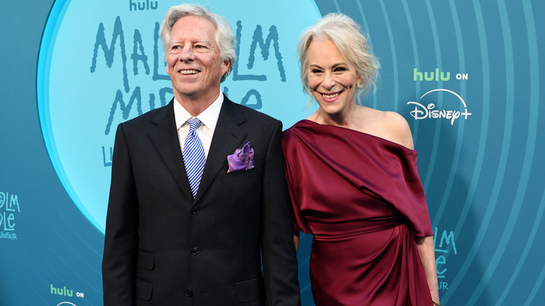 Jane Kaczmarek and Rusty Long posing at the premiere of 'Malcolm in The Middle: Life's Still Unfair.'
