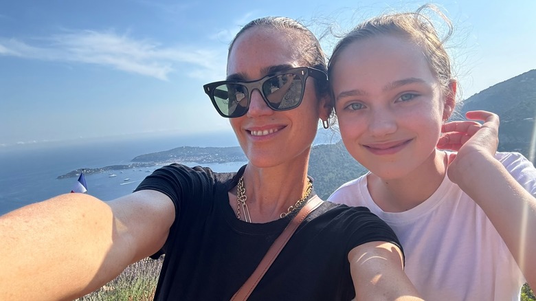 Jennifer Connnelly and Agnes smile on a hike