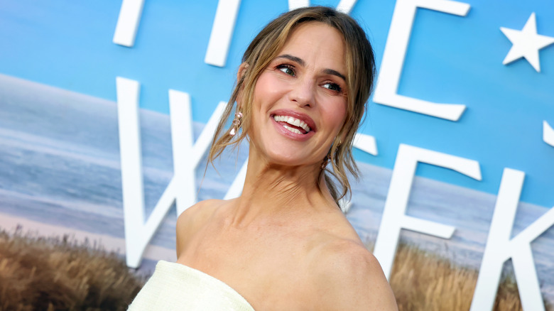 Jennifer Garner posing in a white strapless dress in 2026