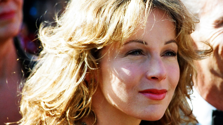 Jennifer Grey smiles while attending the Emmy Awards (1993).