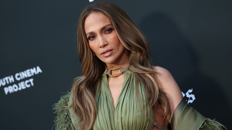 Jennifer Lopez in a green dress with her hair down