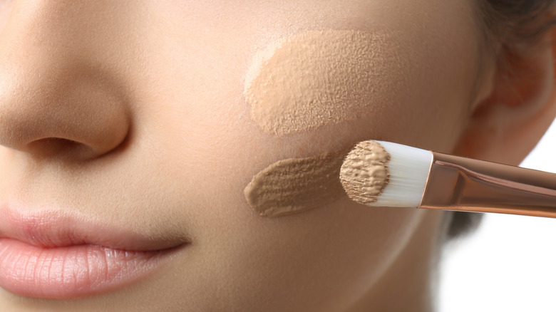 Girl applying cream products