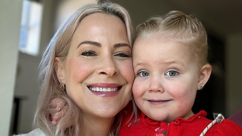 Brittany Daniel and her daughter smiling on a selfie