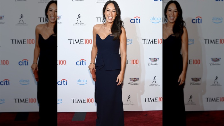 Joanna Gaines wearing a navy dress