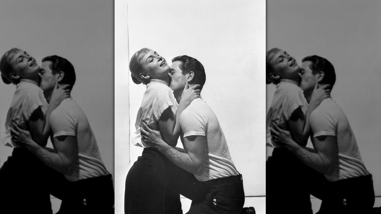 Joanne Woodward and Paul Newman embracing passionately in "The Long Hot Summer."