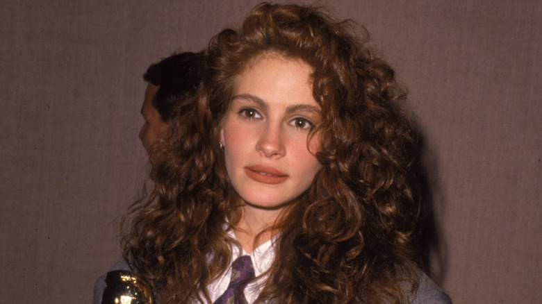 A close up of Julia Roberts wearing an oversized suit at the Oscars