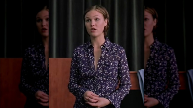 Julia Stiles in "The Prince and Me" wearing a floral purple blouse.