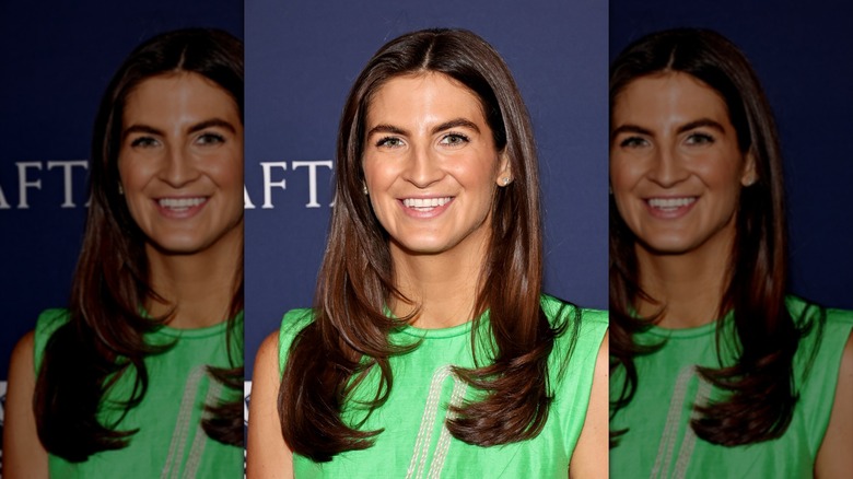Kaitlan Collins with long straight hair face-framing layers