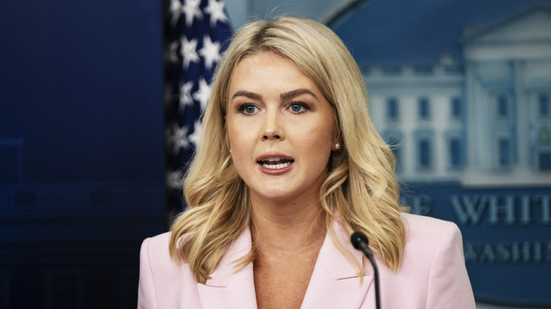 Karoline Leavitt wearing a pink jacket