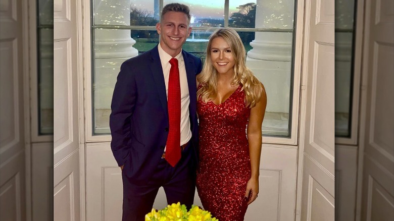Karoline Leavitt poses at the White House Christmas function