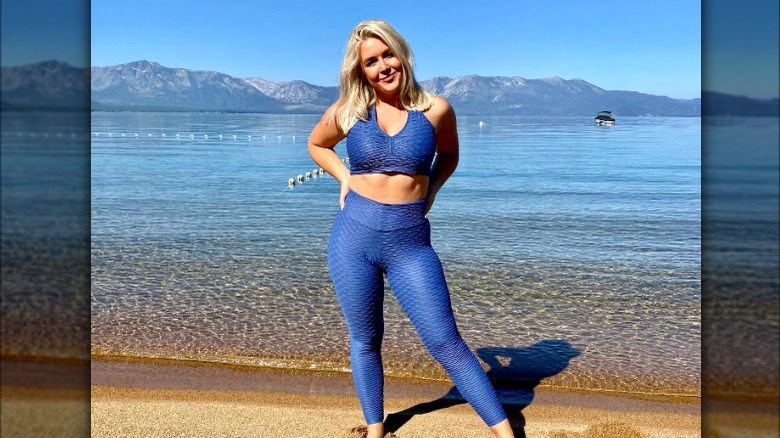 Karoline Leavitt poses next to Lake Tahoe