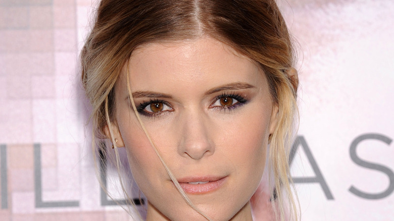 Kate Mara posing at a red-carpet