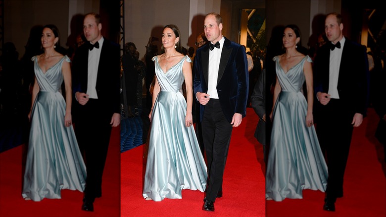 Kate Middleton walks with Prince William wearing a light blue gown