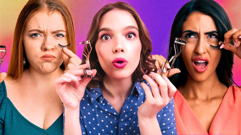 women holding eyelash curlers