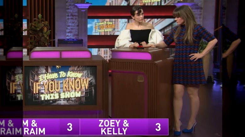 A shot of Kelly Clarkson and guest Zoey Deutch on a segment of The Kelly Clarkson Show
