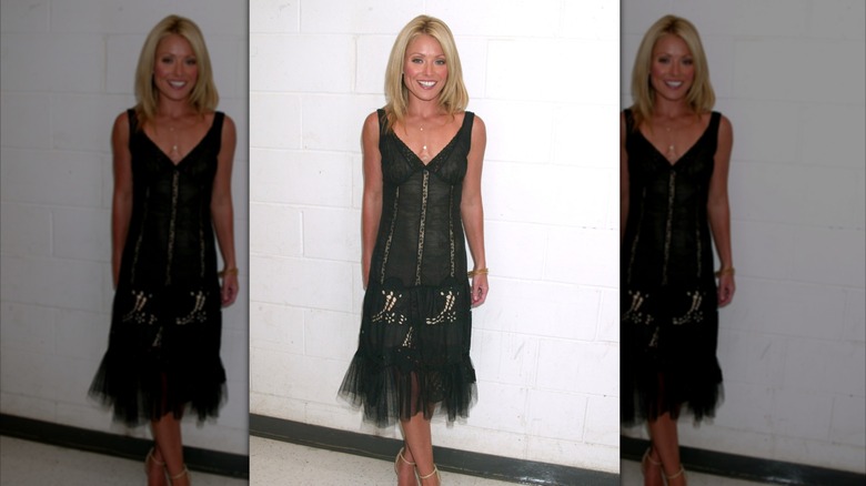 Kelly Ripa poses while at a book launch party