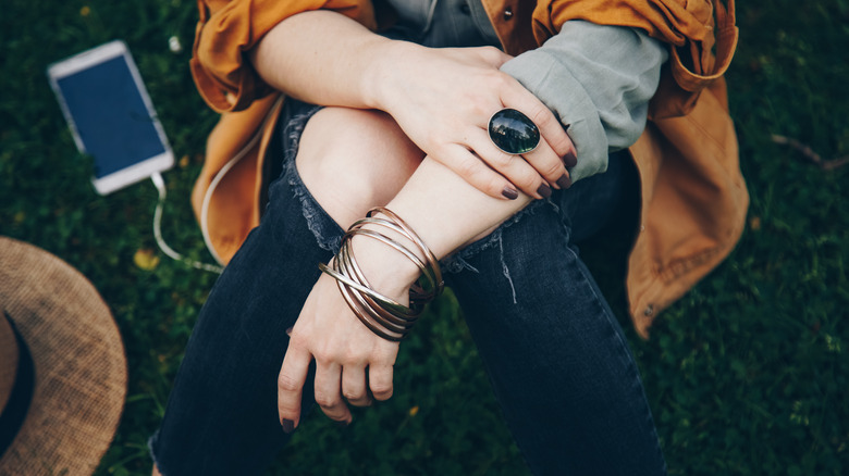 Woman with rings and bracelets
