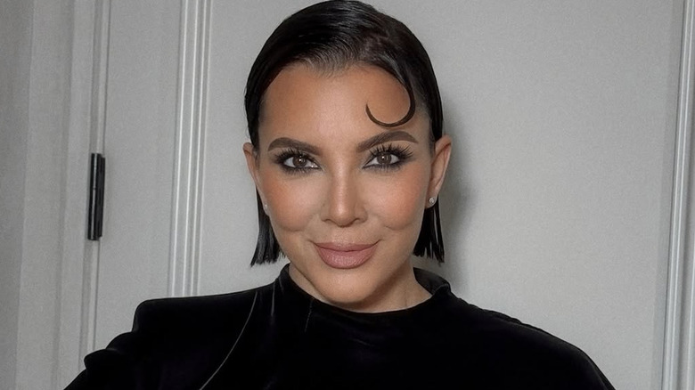 Kris Jenner posing with her new wet-hair look